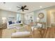 Stylishly furnished living room with natural light, an open layout to the kitchen, and modern decor for comfortable living at 4546 Holly St, North Charleston, SC 29405