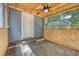 Screened-in porch boasting a unique ceiling fan and access to the backyard and house via door at 4546 Holly St, North Charleston, SC 29405