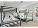 Bedroom offering two bunk beds with gray frames and white linens at 4557 Mixson Ave, North Charleston, SC 29405