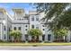 Charming townhomes with modern architectural details and beautifully landscaped front yards at 4557 Mixson Ave, North Charleston, SC 29405