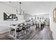 Open-concept kitchen and dining area featuring modern cabinets, countertops, and stainless steel appliances at 4557 Mixson Ave, North Charleston, SC 29405