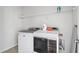 Functional laundry room equipped with modern washer and dryer units at 4557 Mixson Ave, North Charleston, SC 29405