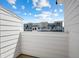Balcony with views of exterior building with white siding and blue skies at 4585 Summey St, North Charleston, SC 29405