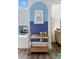 Stylish bar cart with glassware and accessories, adding a touch of elegance to the living space at 4585 Summey St, North Charleston, SC 29405