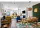 Inviting living space with modern furnishings and decor, seamlessly blending living and dining areas at 4585 Summey St, North Charleston, SC 29405