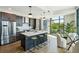 Modern kitchen offering stainless steel appliances, stylish cabinetry, and a spacious center island at 5 Gadsdenboro St # 204, Charleston, SC 29401