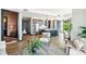 Beautiful open-concept living area showcasing the kitchen with stainless appliances and modern finishes at 5 Gadsdenboro St # 204, Charleston, SC 29401