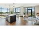 Bright, open floor plan with modern kitchen island and comfortable living area with natural light at 5 Gadsdenboro St # 204, Charleston, SC 29401