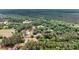 This aerial perspective reveals the property with home, trees, and surrounding greenery, capturing the essence of the area at 5056 Red Oak Rd, Cottageville, SC 29435