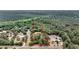 A bird's eye view showcases the property's mature trees, spacious lot, and the house's proximity to the surrounding forest at 5056 Red Oak Rd, Cottageville, SC 29435