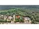 Bird's eye view reveals a home nestled within a canopy of trees, showcasing privacy and natural landscape at 5056 Red Oak Rd, Cottageville, SC 29435