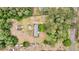 Aerial view of a home nestled among lush trees, offering privacy and serenity at 5056 Red Oak Rd, Cottageville, SC 29435