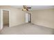 Neutral bedroom with a ceiling fan and an open door to the closet at 5056 Red Oak Rd, Cottageville, SC 29435