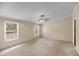 View of the bedroom with ceiling fan and two windows at 5056 Red Oak Rd, Cottageville, SC 29435