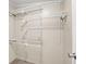 A closet featuring a wall-mounted shelf system at 5056 Red Oak Rd, Cottageville, SC 29435
