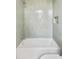 Bathtub with light-green tile surround and convenient in-wall shelf; simple and elegant at 525 Old Bridge Ct, Mount Pleasant, SC 29464