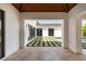 Picturesque courtyard with decorative stone and grass, framed by white brick walls and a wood ceiling at 525 Old Bridge Ct, Mount Pleasant, SC 29464