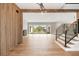 Inviting foyer featuring a staircase, wood accents, and natural light streaming through large windows at 525 Old Bridge Ct, Mount Pleasant, SC 29464