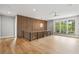 Spacious hallway with hardwood floors, a modern ceiling fan and plenty of light at 525 Old Bridge Ct, Mount Pleasant, SC 29464