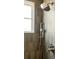 Close up of shower featuring a hand shower, shower head, and window at 525 Old Bridge Ct, Mount Pleasant, SC 29464