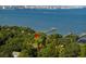 Aerial view of waterfront property with private piers and mature landscaping at 528 Wampler Dr, Charleston, SC 29412