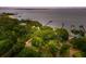 A high angle view of waterfront homes lined with private docks along the shoreline at 528 Wampler Dr, Charleston, SC 29412
