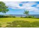 Beautifully landscaped backyard with waterfront views and a serene setting at 528 Wampler Dr, Charleston, SC 29412
