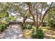 Charming single story brick home with a two car garage and mature trees at 528 Wampler Dr, Charleston, SC 29412