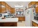 Functional kitchen with wood cabinets, a white countertop, and modern appliances at 528 Wampler Dr, Charleston, SC 29412