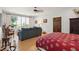 Comfortable bedroom with a sitting area, tiled floors, and natural light from a window at 528 Wampler Dr, Charleston, SC 29412