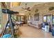Bright sunroom with tile floors, brick accents, and waterfront views at 528 Wampler Dr, Charleston, SC 29412