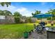 Backyard with a paver patio, outdoor furniture, grill, and a lush green lawn at 532 Sunset Dr, Charleston, SC 29407
