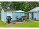 Backyard featuring shed and patio area with outdoor furniture and grill at 532 Sunset Dr, Charleston, SC 29407