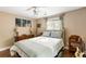 Bedroom features a queen bed, wood floors, natural light, and warm neutral paint at 532 Sunset Dr, Charleston, SC 29407