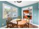Cozy dining area with hardwood floors, natural light, and adjacent access to the kitchen at 532 Sunset Dr, Charleston, SC 29407