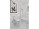 Elegant bathroom featuring marble floors, a bathtub, and modern fixtures at 5774 Scott White Rd, Hollywood, SC 29449