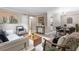 Inviting living room and dining area showcasing stylish decor, a modern table, and comfortable seating at 6240 Old Point Rd # C-8, Hanahan, SC 29410