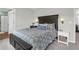 A bedroom featuring a dark wood bed with floral bedding and matching bedside tables at 725 Pepperbush St, Charleston, SC 29414