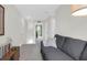 Upstairs sitting room area with a gray sofa and side table at 725 Pepperbush St, Charleston, SC 29414