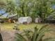 Large backyard with storage sheds, providing ample space for outdoor activities at 759 Powhatan Ave, Mount Pleasant, SC 29464