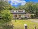 Charming two-story home featuring a well-manicured lawn and beautiful landscaping at 759 Powhatan Ave, Mount Pleasant, SC 29464