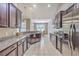 Well-equipped kitchen with granite countertops, stainless steel appliances, and ample cabinet space at 7690 High Maple Cir, North Charleston, SC 29418