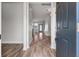 Inviting foyer with light gray walls and beautiful wood flooring at 7780 Montview Rd, North Charleston, SC 29418