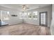 Bright living room with lots of natural light and ceiling fan at 7780 Montview Rd, North Charleston, SC 29418