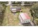 Aerial view of a home and separate garage, showcasing outdoor space and building features at 8476 Old Georgetown Rd, McClellanville, SC 29458