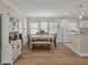 Dining area features hardwood floors and natural light at 8476 Old Georgetown Rd, McClellanville, SC 29458