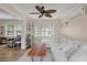 Cozy living room features ample seating and natural light at 8476 Old Georgetown Rd, McClellanville, SC 29458