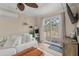Bright living room with sliding door to the outdoor deck at 8476 Old Georgetown Rd, McClellanville, SC 29458