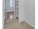 Walk in closet with carpet and shelving at 8774 Adaline St, North Charleston, SC 29406