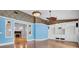 Spacious living room featuring a fireplace and custom shelving at 8774 Adaline St, North Charleston, SC 29406